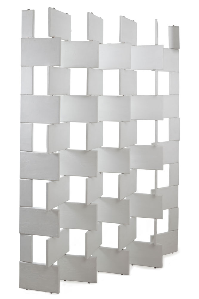Image of a white painted wooden screen created from 54 panels stacked askew.