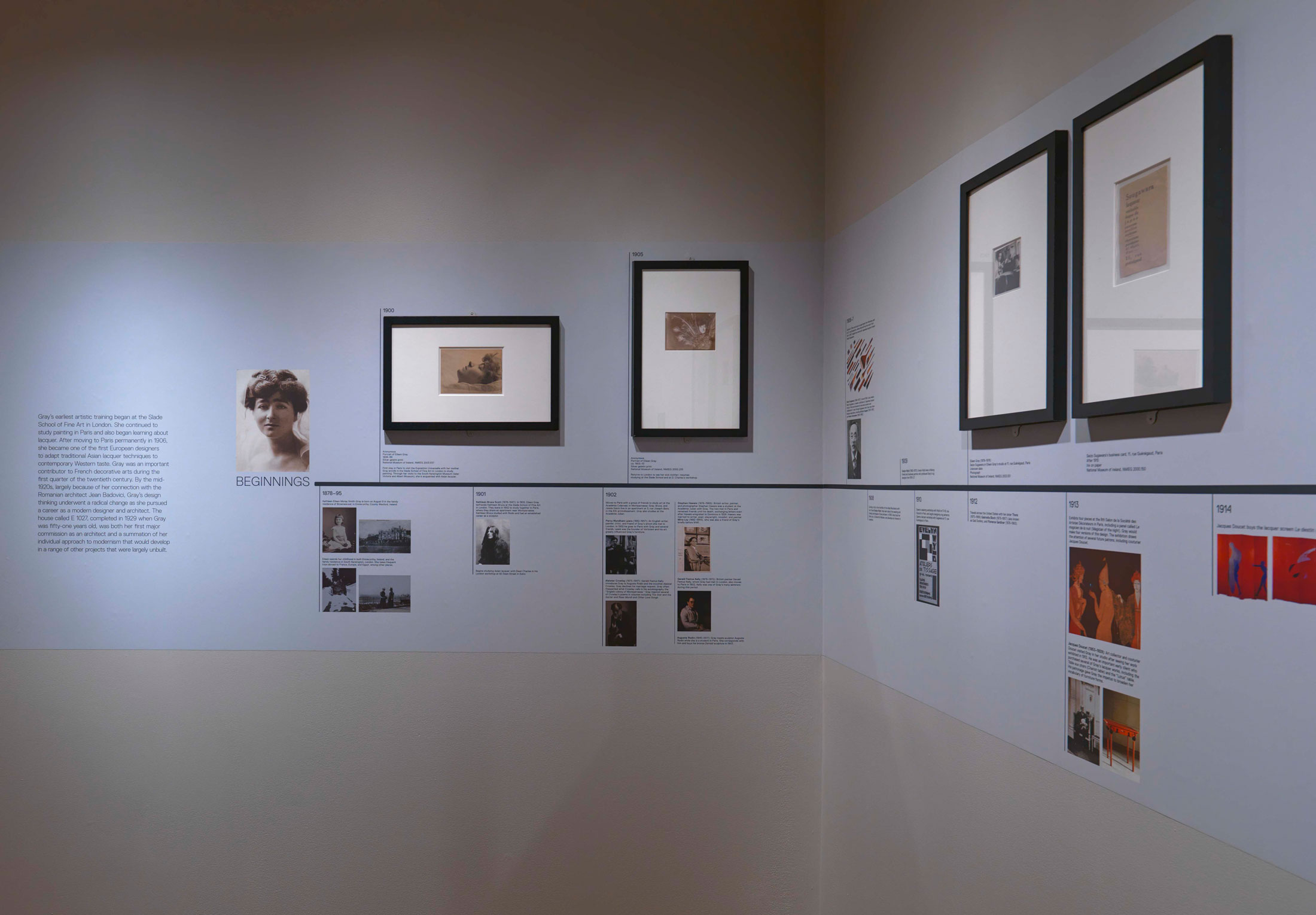 Exhibition view of timeline of Eileen Gray's life.