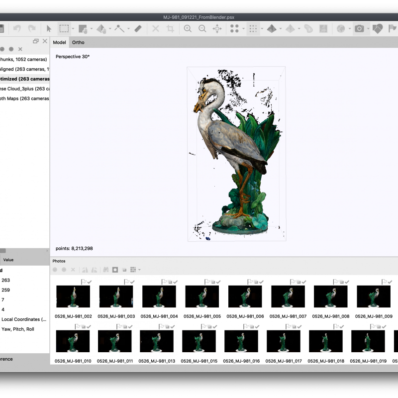 screenshot of window, closely packed colored point cloud resembling a heron figure