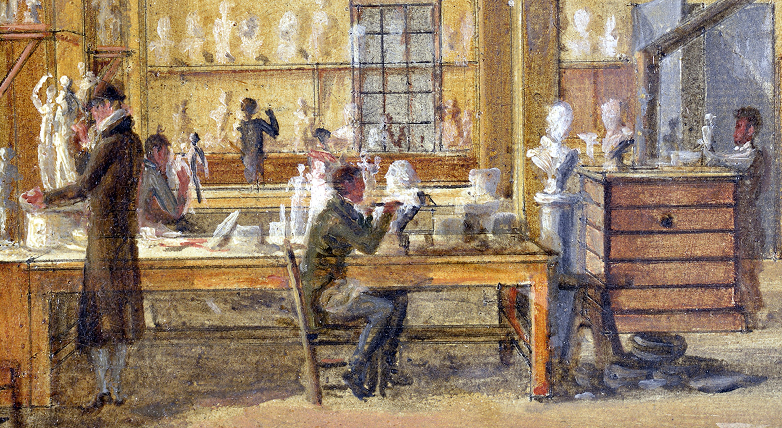 Painting of a bustling sculptor's workshop, with several artists working on busts and figures. The room is lined with completed sculptures on shelves, and a large window lets in natural light. Two central figures are detailed, focusing intently on their work.