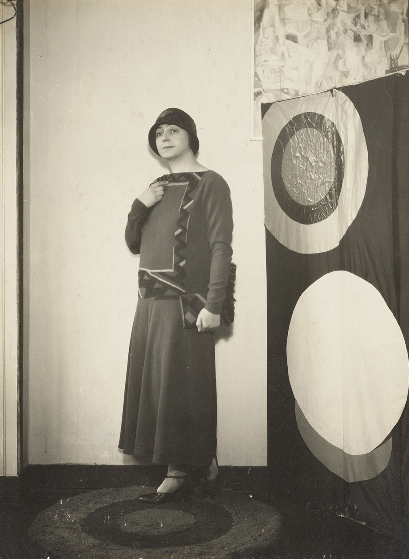Photograph of Sonia Delaunay wearing her own dress design.