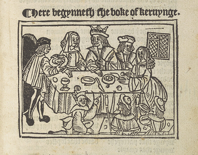 Illustration of a group of people gathered around a table for a feast being served dishes of food and entertained. Text above the illustration reads, "Here begynneth the boke of keruynge."