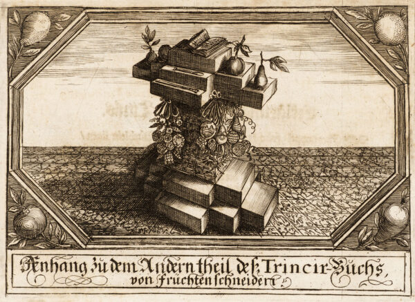 Illustration of a stack of blocks and a column topped by a book, fruits, and carving tools. A border around the image features a fruit in each corner and ornate German text at the bottom.